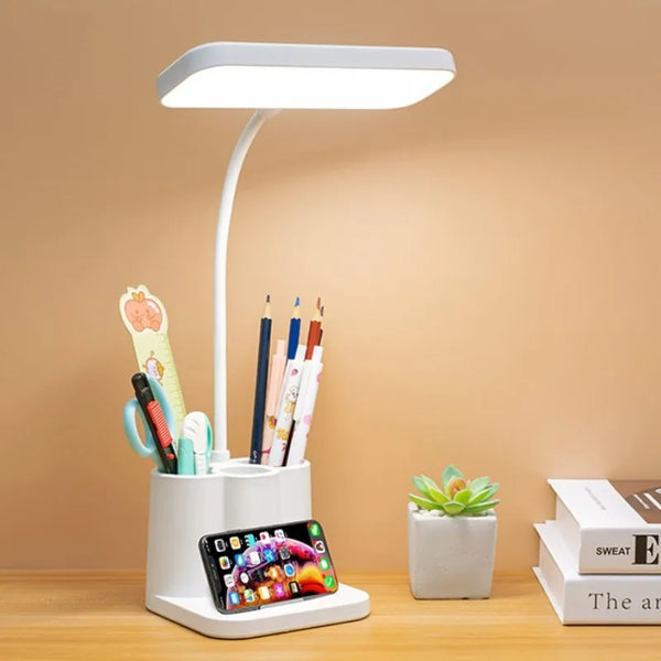 Vytra Study Lamp on dorm desk with pen holder and phone stand
